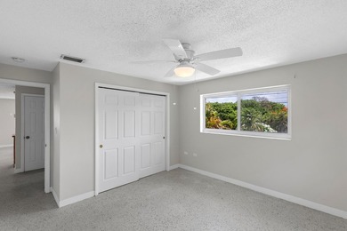 Waterfront duplex located on a wide, deep boating canal with - photo 14