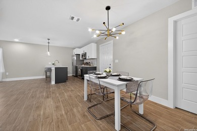 This charming fully renovated home nestled in an established - photo 14