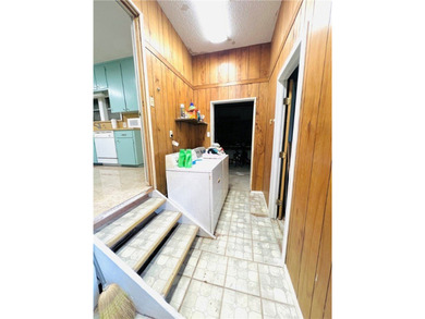 ROOM FOR EVERYTHING! This charming 2-bedroom, 1-bath home sits - photo 15