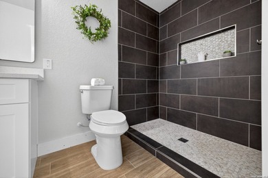 This charming fully renovated home nestled in an established - photo 22