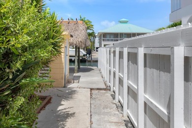 Waterfront duplex located on a wide, deep boating canal with - photo 26