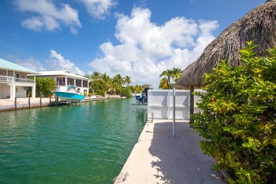 Waterfront duplex located on a wide, deep boating canal with - photo 31