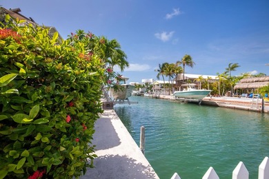 Waterfront duplex located on a wide, deep boating canal with - photo 32