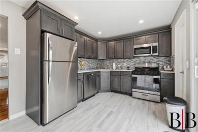 Welcome to 1818 East 37th Street, a beautifully renovated - photo 7
