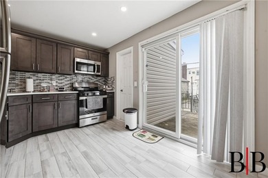 Welcome to 1818 East 37th Street, a beautifully renovated - photo 8