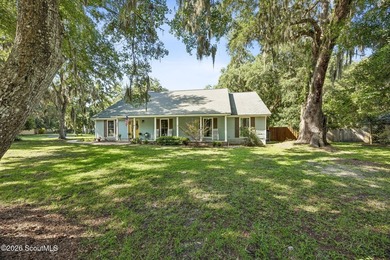This incredible 4-bedroom, 2-bath home sits on a large corner - photo 4
