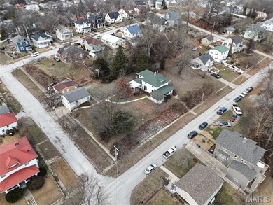 This historic charmer is situated on 4 1/2 lots that come alive