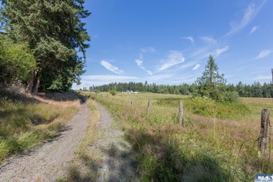 Lovely setting in desirable area of Sequim to set down your - photo 1