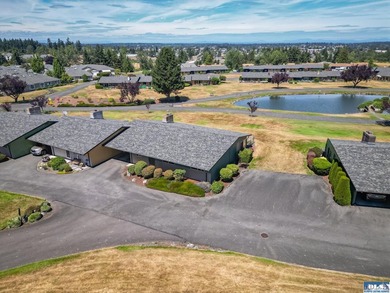 Enjoy easy living in this beautifully situated end-unit condo in - photo 6