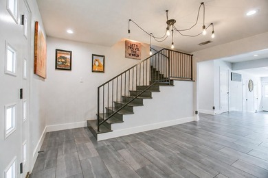 Completely remodeled 3-bedroom, 3-bathroom lake house offering - photo 9