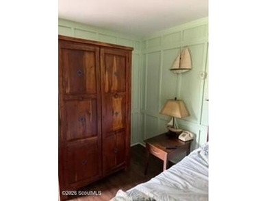 Discover the charm of Pier Village in this beautifully located - photo 4