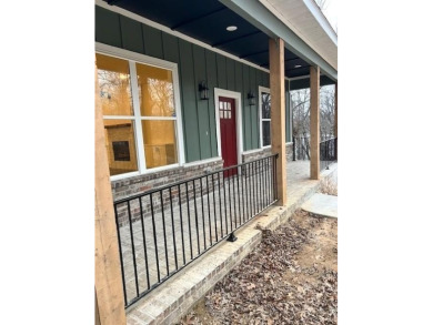 Beautiful NEW lake home for sale on Beaver Lake with 1.68 acres