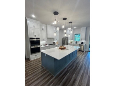 Beautiful NEW lake home for sale on Beaver Lake with 1.68 acres