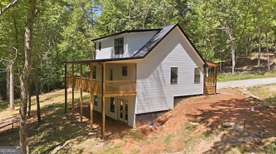 PICTURESQUE NORTHEAST GEORGIA SETTING OF 3 PRIVATE, WOODED ACRES - photo 11