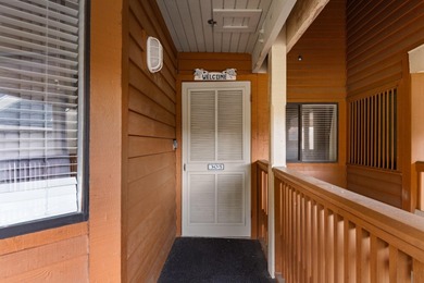 This move-in ready, updated two-bedroom, two-bath condo features