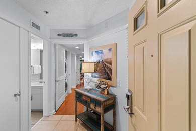 This move-in ready, updated two-bedroom, two-bath condo features