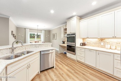 Welcome to this stunning, custom-built 2020 brick home in a