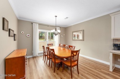 Welcome to this stunning, custom-built 2020 brick home in a