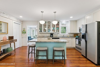 Check out this unique beach cottage in the south end! Enjoy the - photo 4