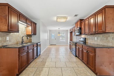 Charming home on over an acre in the heart of Cabot! Welcome to