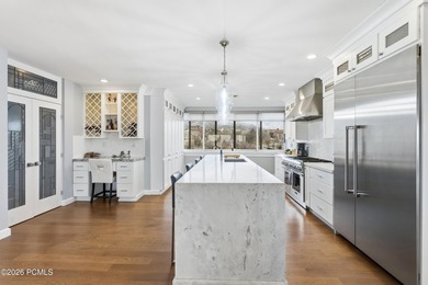 Wasatch Towers Penthouse No. 1001 commands the entire top floor