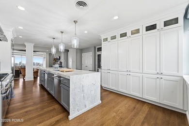 Wasatch Towers Penthouse No. 1001 commands the entire top floor