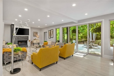 Constructed with a brick and stone exterior and highlighted by - photo 9