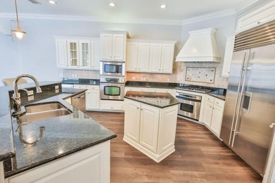 Set within the gated, impeccably maintained golf and lifestyle - photo 5