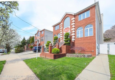 Welcome to this beautiful two-family home in the highly - photo 4