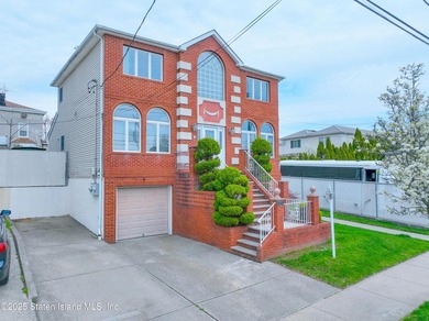 Welcome to this beautiful two-family home in the highly - photo 5