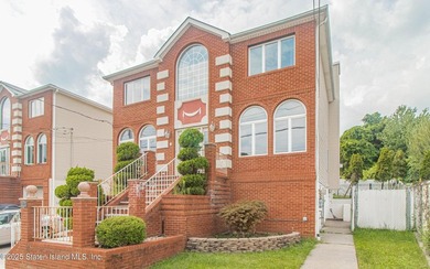 Welcome to this beautiful two-family home in the highly - photo 6