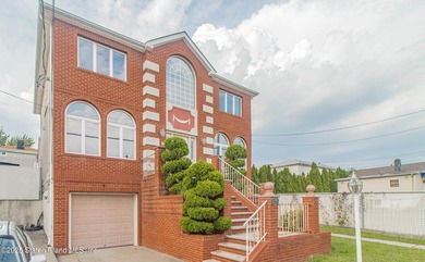 Welcome to this beautiful two-family home in the highly - photo 7