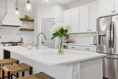 This beautifully designed raised beach home built in 2022 offers