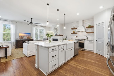 This beautifully designed raised beach home built in 2022 offers