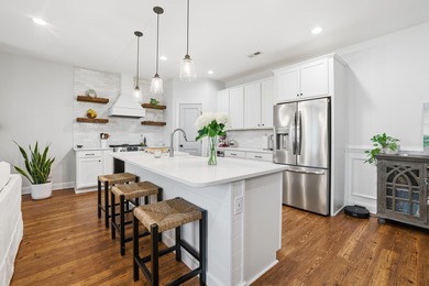 This beautifully designed raised beach home built in 2022 offers