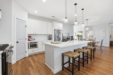 This beautifully designed raised beach home built in 2022 offers