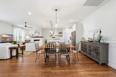 This beautifully designed raised beach home built in 2022 offers