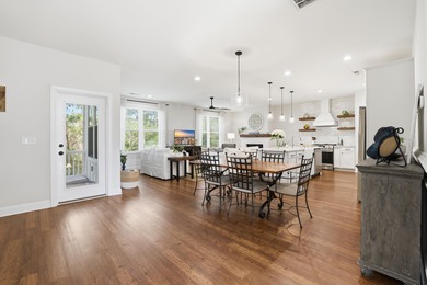 This beautifully designed raised beach home built in 2022 offers