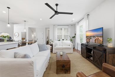 This beautifully designed raised beach home built in 2022 offers