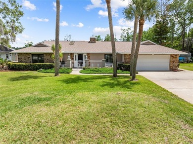 Fantastic FOUR-bedroom THREE- bath pool home situated on a 0.732 - photo 1