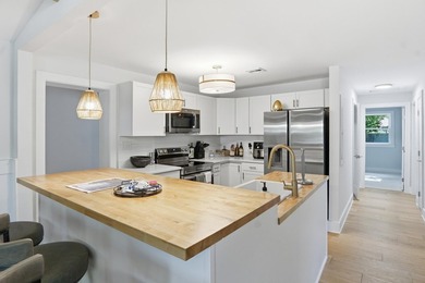 Welcome to 32 Briarcliff Dr., a beautifully updated 4-bedroom - photo 13