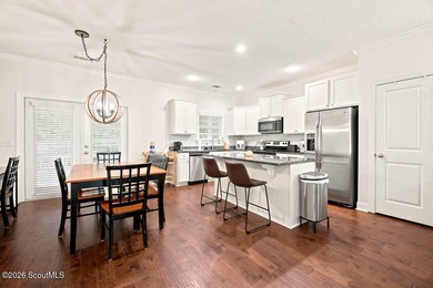 Nestled on a quiet street in the desirable mid-north area of St - photo 8