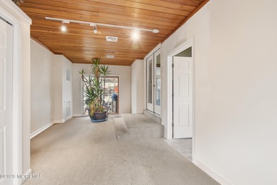 Welcome to this stunning 6-bedroom, 4.5-bathroom home located in