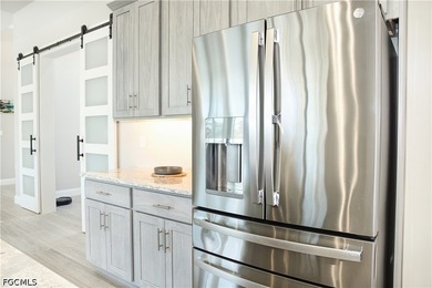 Welcome to modern luxury living at its best! This barely - photo 33