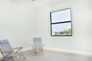 Welcome to modern luxury living at its best! This barely - photo 46