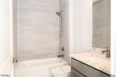 Welcome to modern luxury living at its best! This barely - photo 50