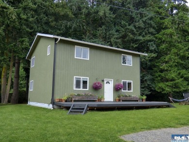 Tucked among mature trees and lovingly maintained, this inviting - photo 4