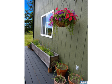 Tucked among mature trees and lovingly maintained, this inviting - photo 5