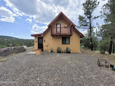 HOME WITH LAKE VIEW! Perched above the shimmering waters of Lake - photo 2
