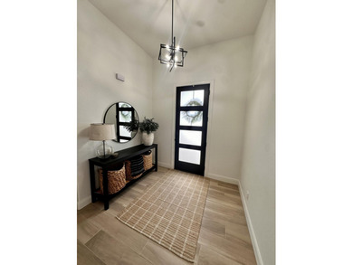 Welcome to this cozy 4-bedroom, 2-bathroom retreat nestled in - photo 2